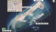 Description: nh vệ tinh Airbus Defence & Space chụp ngày 14/11/2014 cho thấy Trung Quốc đã cải tạo và mở rộng đá Chữ Thập thành đảo nhân tạo rất lớn (hơn đảo Ba Bình đang bị Đài Loan chiếm đóng)