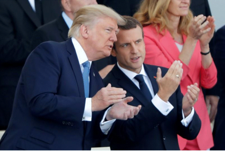 Tổng thống Pháp Macron và Tổng thống Mỹ Trump tham dự lễ diễu binh kỷ niệm Quốc khánh Pháp tại Paris (Pháp) ngày 14-7. Ảnh: REUTERS